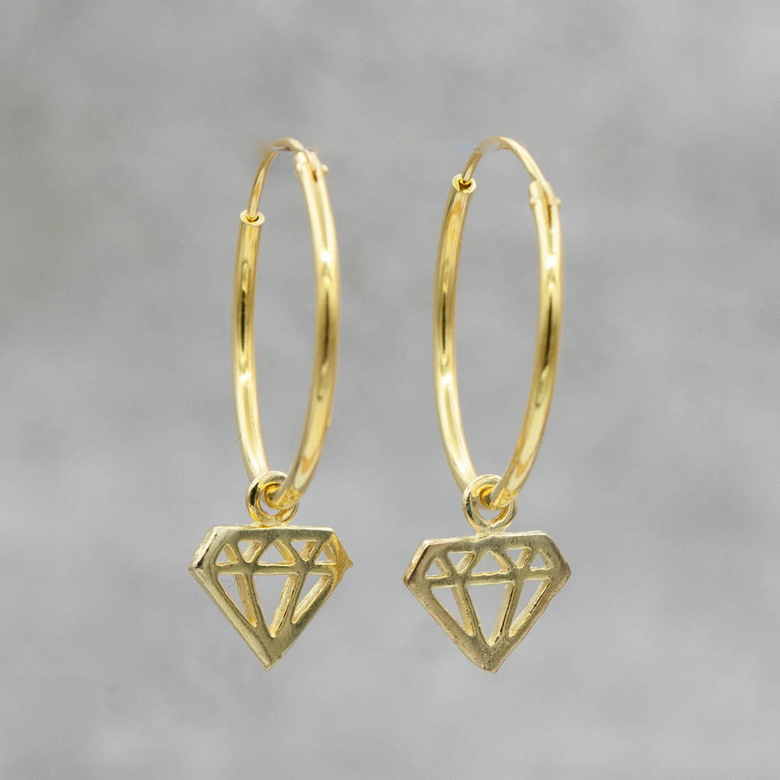 Big Gold hoop with a diamond