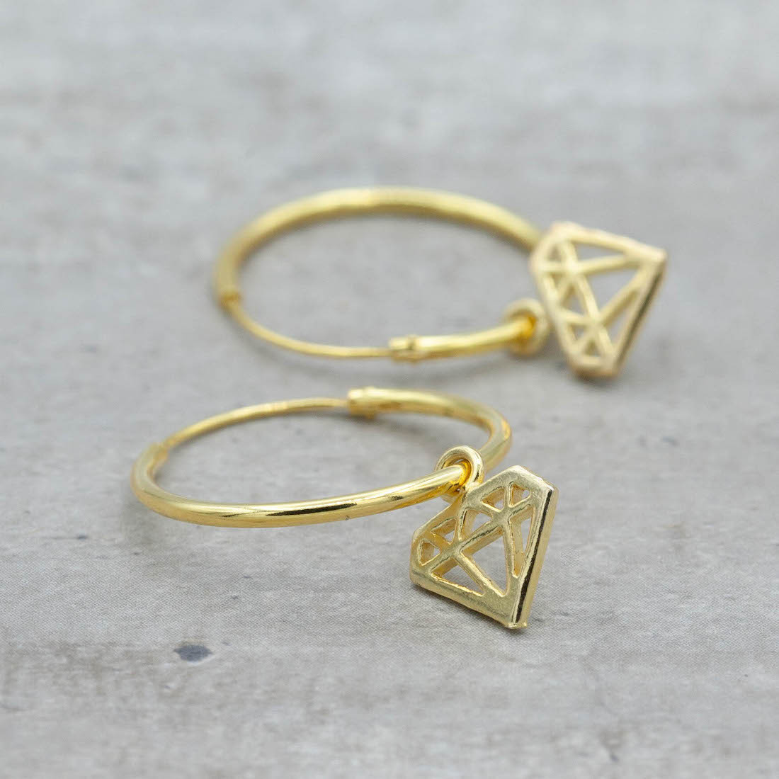 Big Gold hoop with a diamond