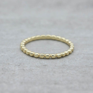 Gold ring with small dots