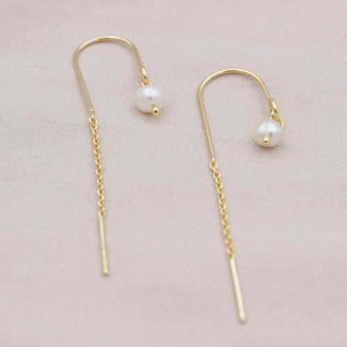 Silver earrings hanging pearl