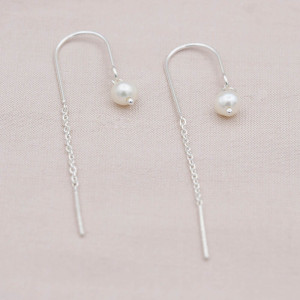 Silver earrings hanging pearl