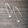Silver earrings treaded chain with star