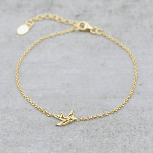Gold bracelet swallow