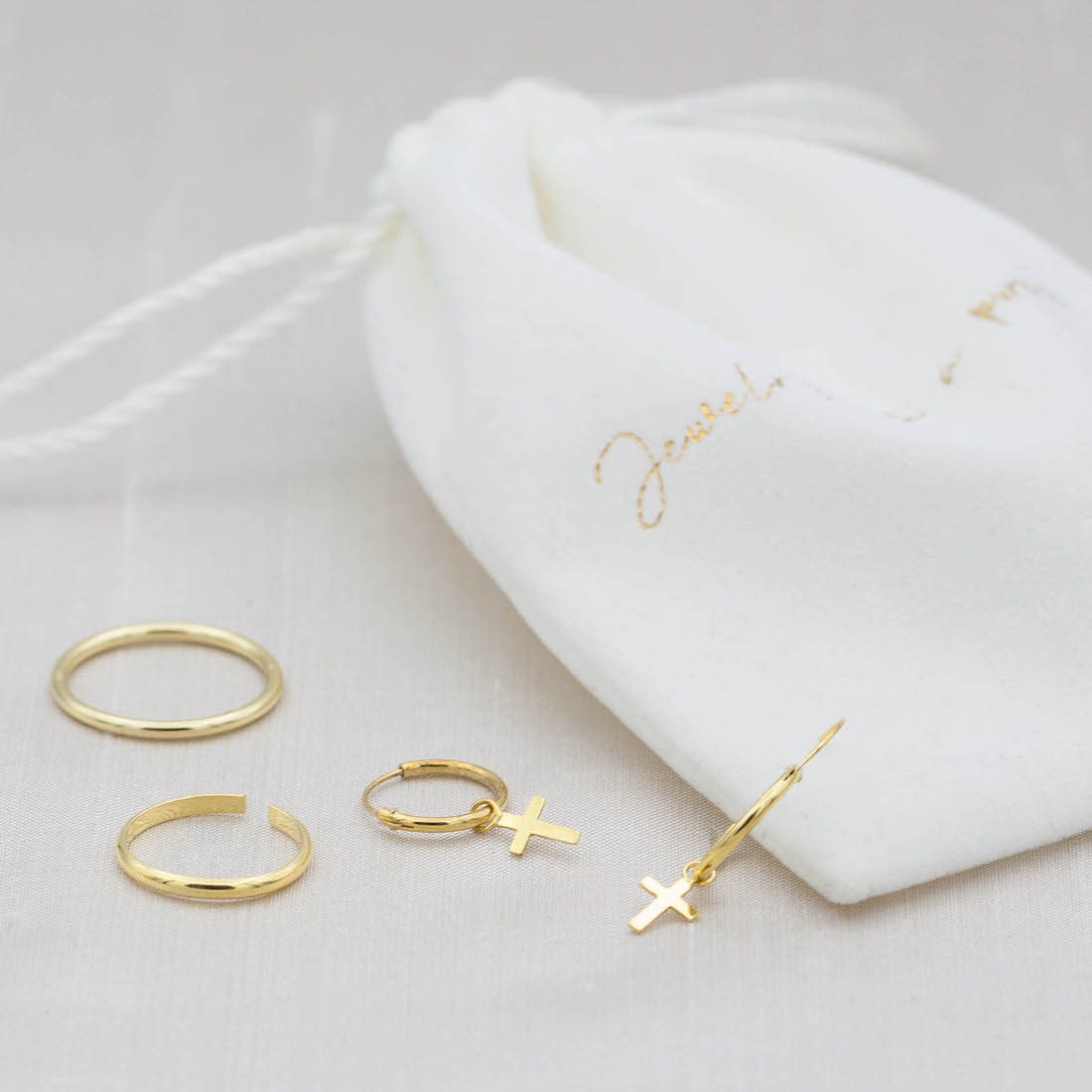 Gold hoop with cross