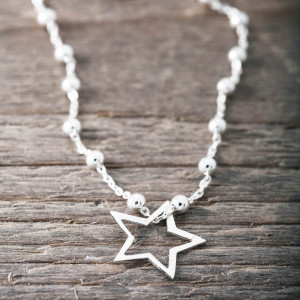 Silver chain with open star