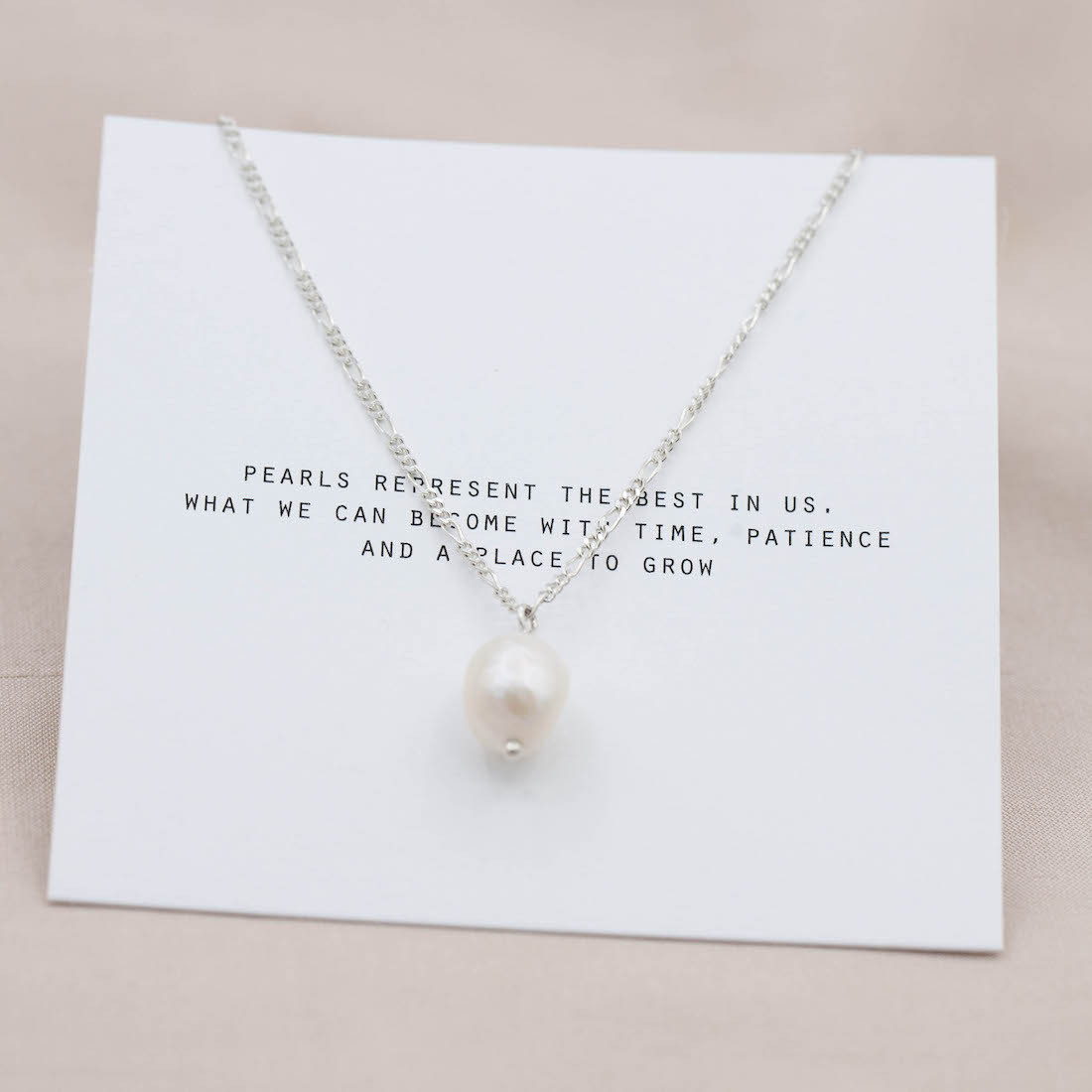 Silver necklace with a fresh water pearl