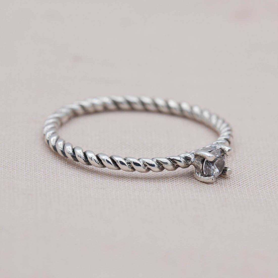 Silver ring twisted with C/Z stone