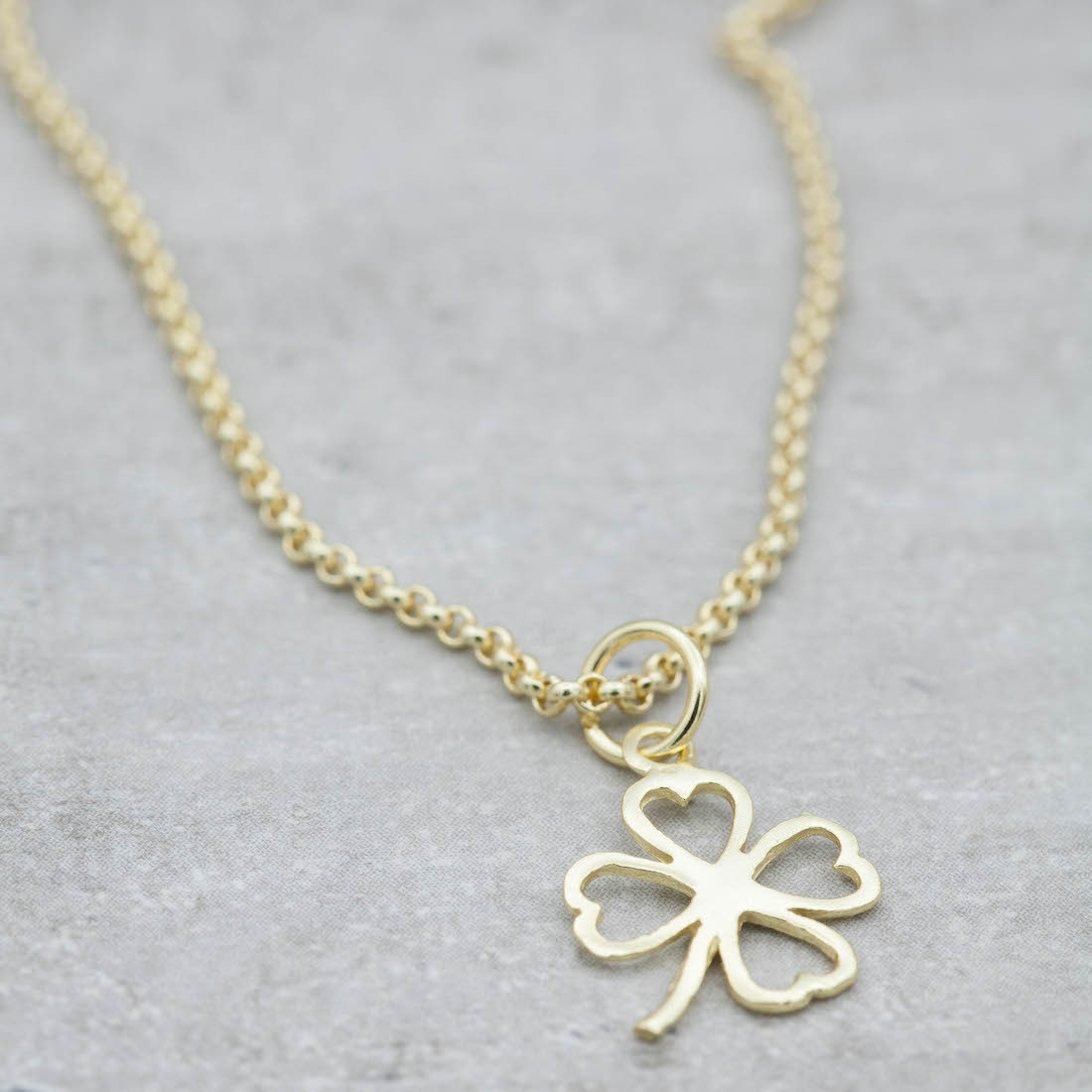 Gold necklace four leaf clover