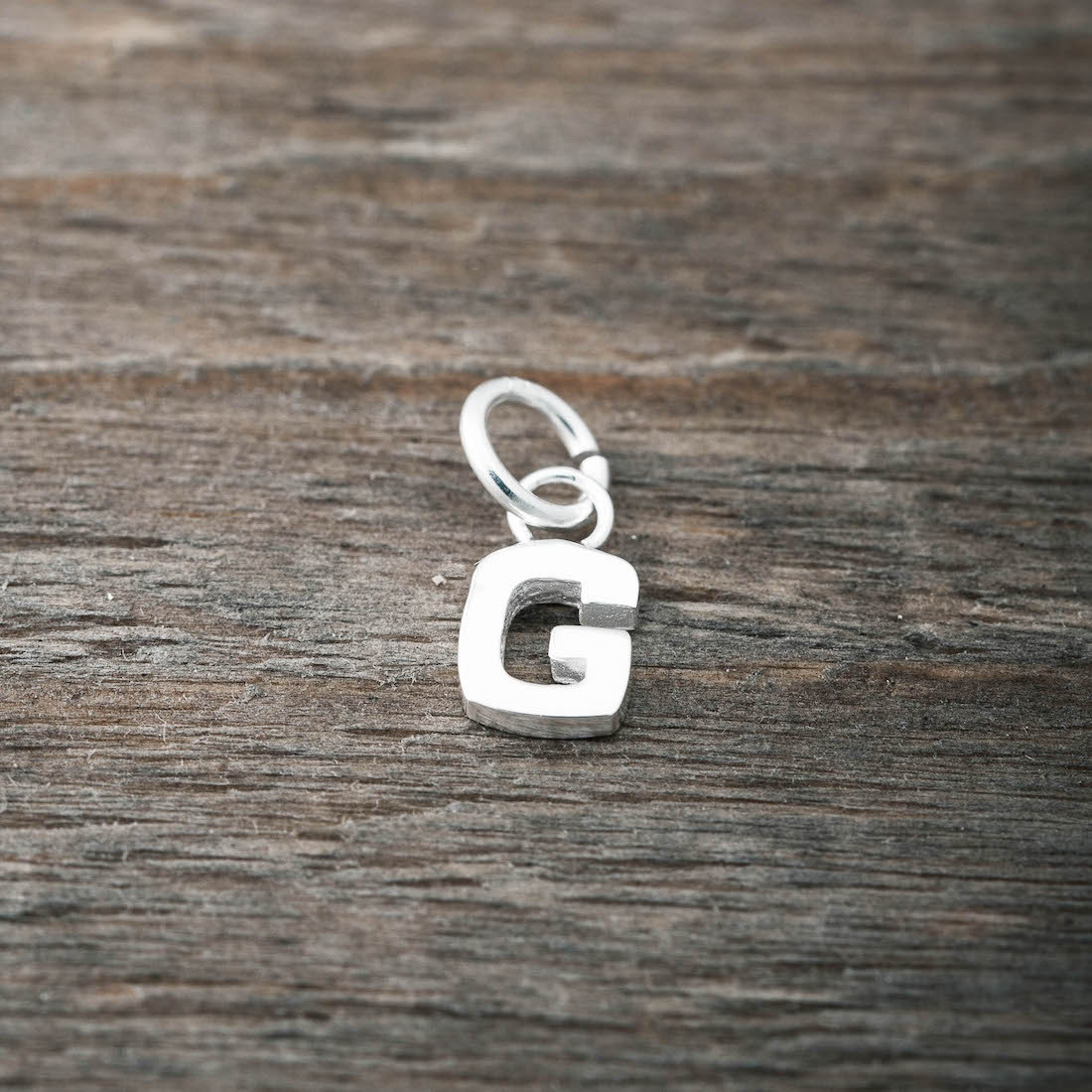 Silver charm G