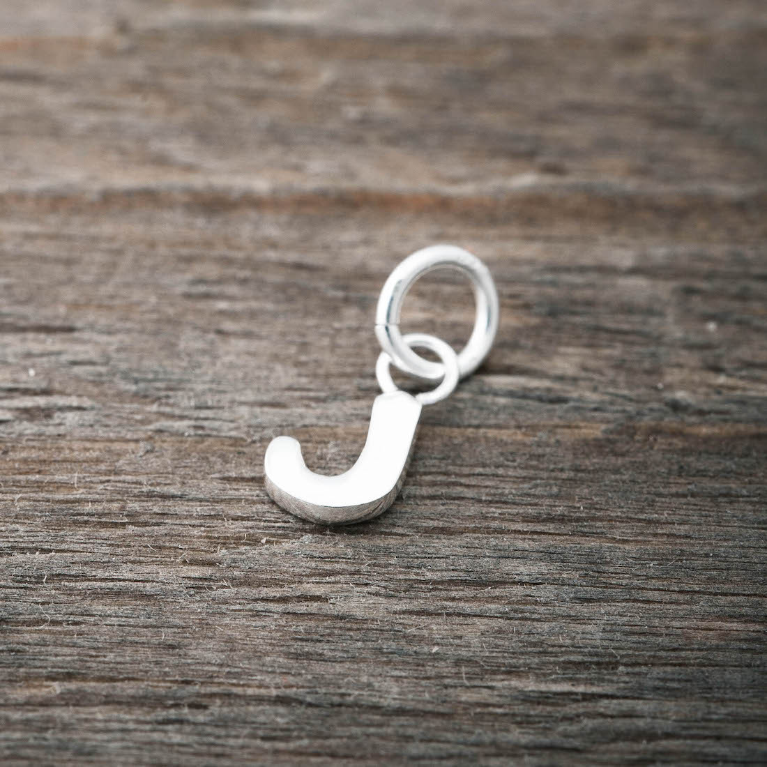 Silver charm J