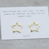 Gold earrings contour star