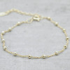 Gold bracelet thin with balls