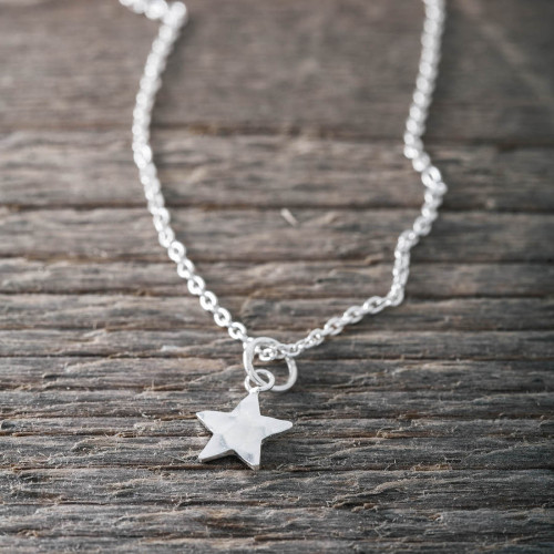 Silver necklace hammered star