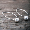 Silver earrings hanging ball