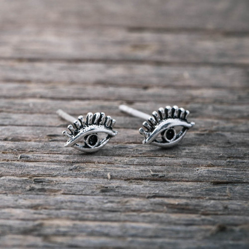 Silver earrings eye