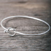 Silver bangle love knot