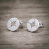 Silver earrings compass