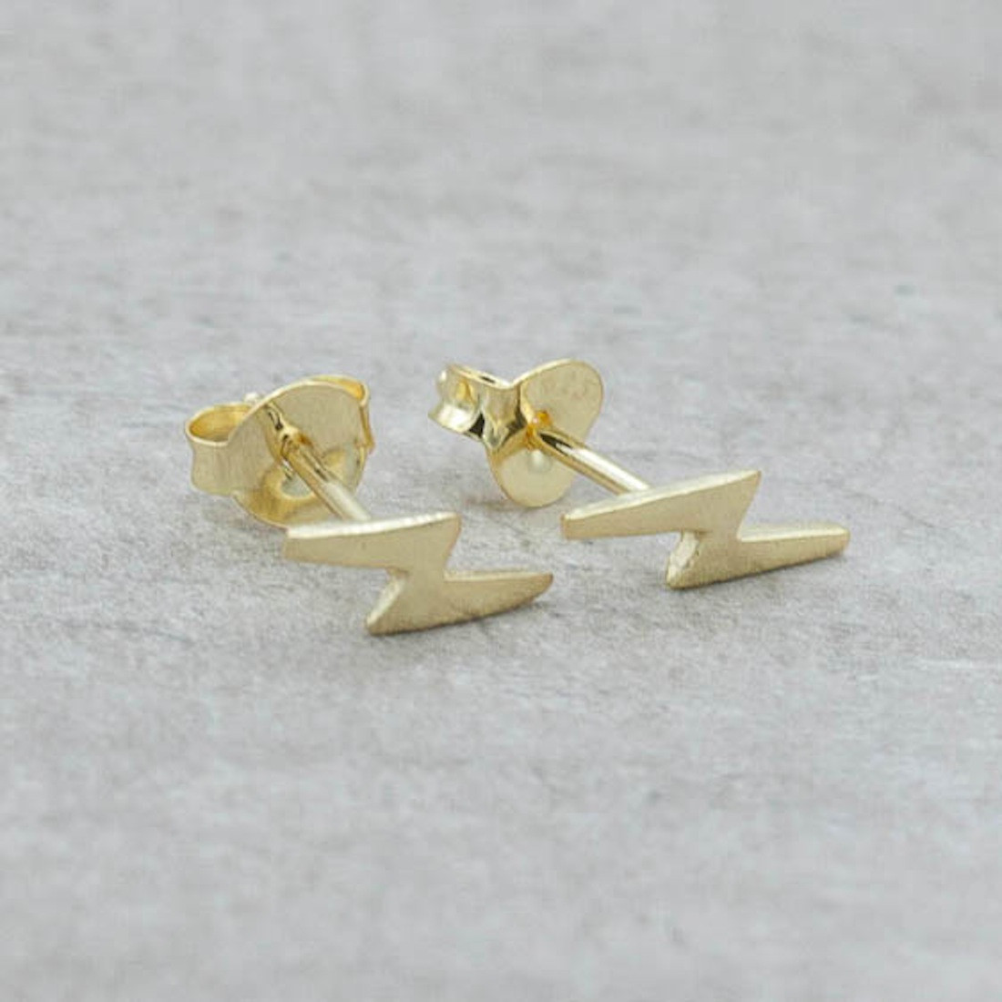 Gold earrings lightning bolt