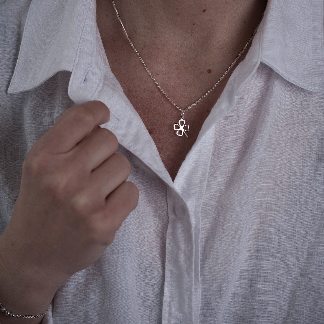 Gold necklace four leaf clover