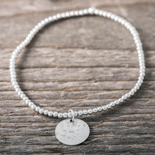 Silver bracelet hammered disc