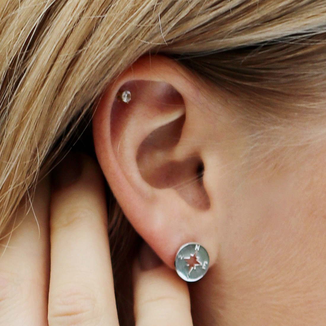 Silver earrings compass