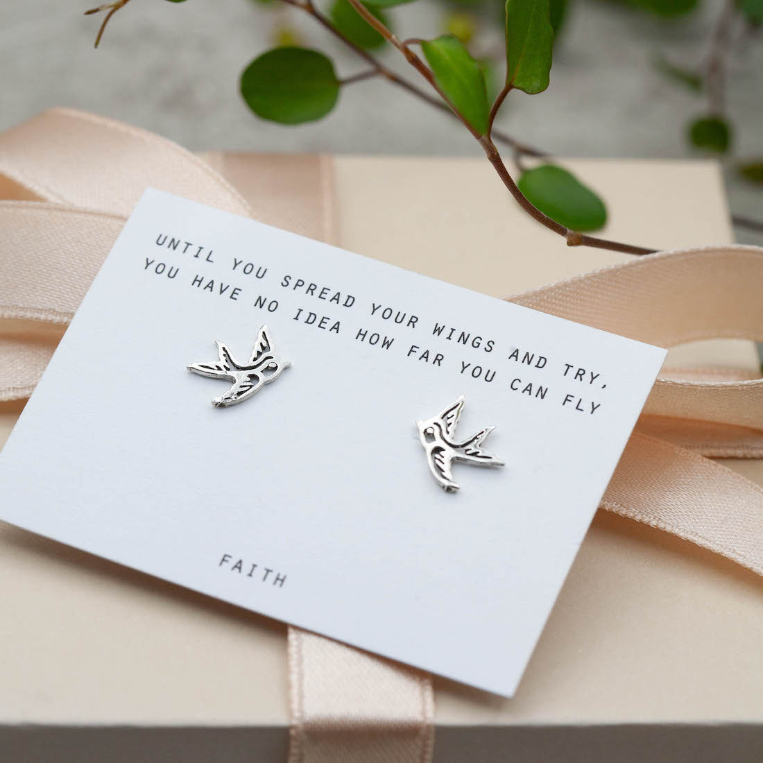 Silver earrings contour swallow