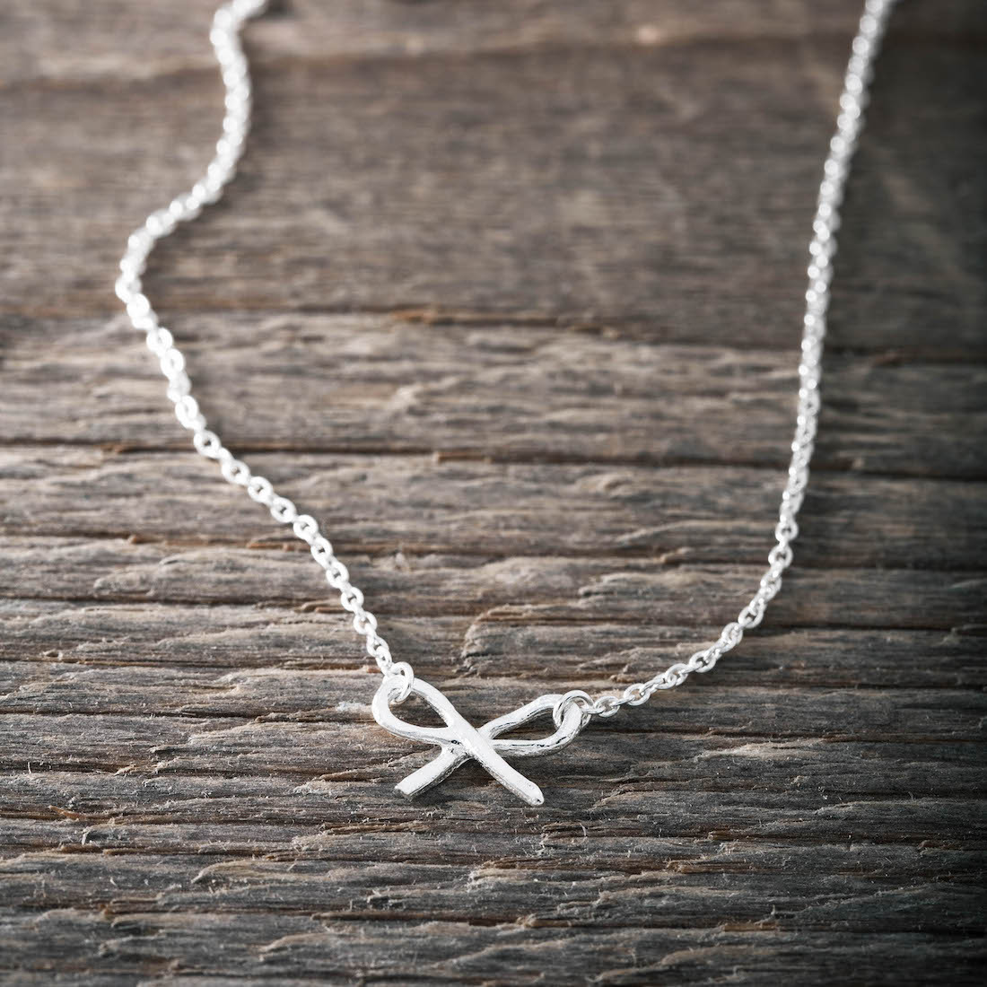 Silver necklace small bow
