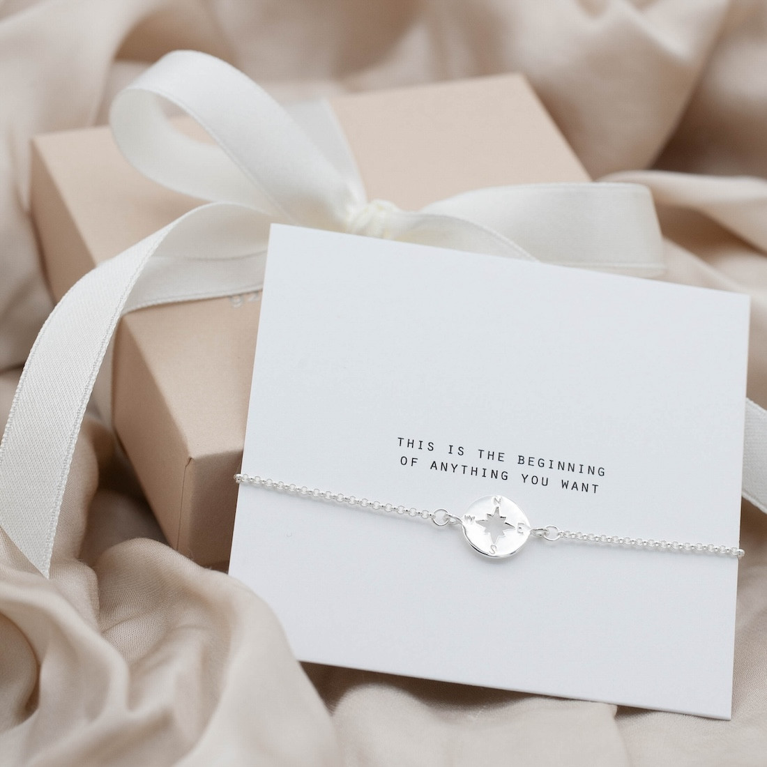 Silver bracelet compass