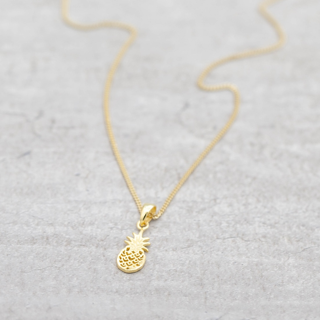 Guldhalsband ananas