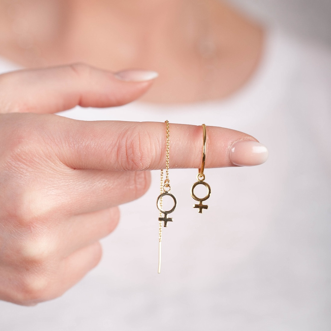 Big Gold hoop with a female sign