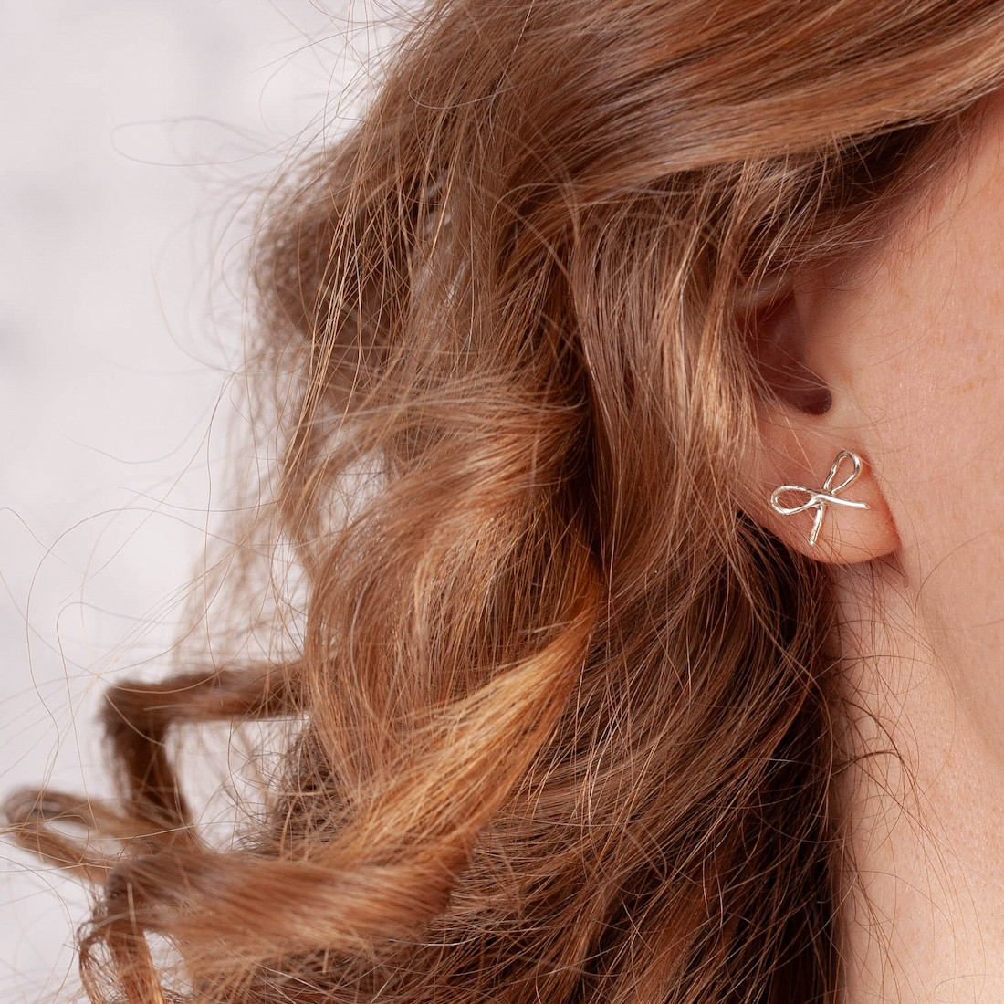 Silver earrings small bow