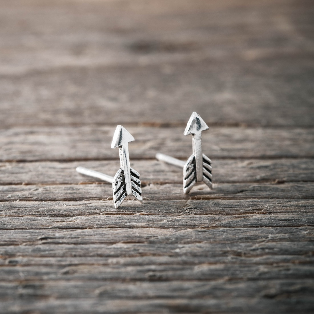 Silver earrings arrow
