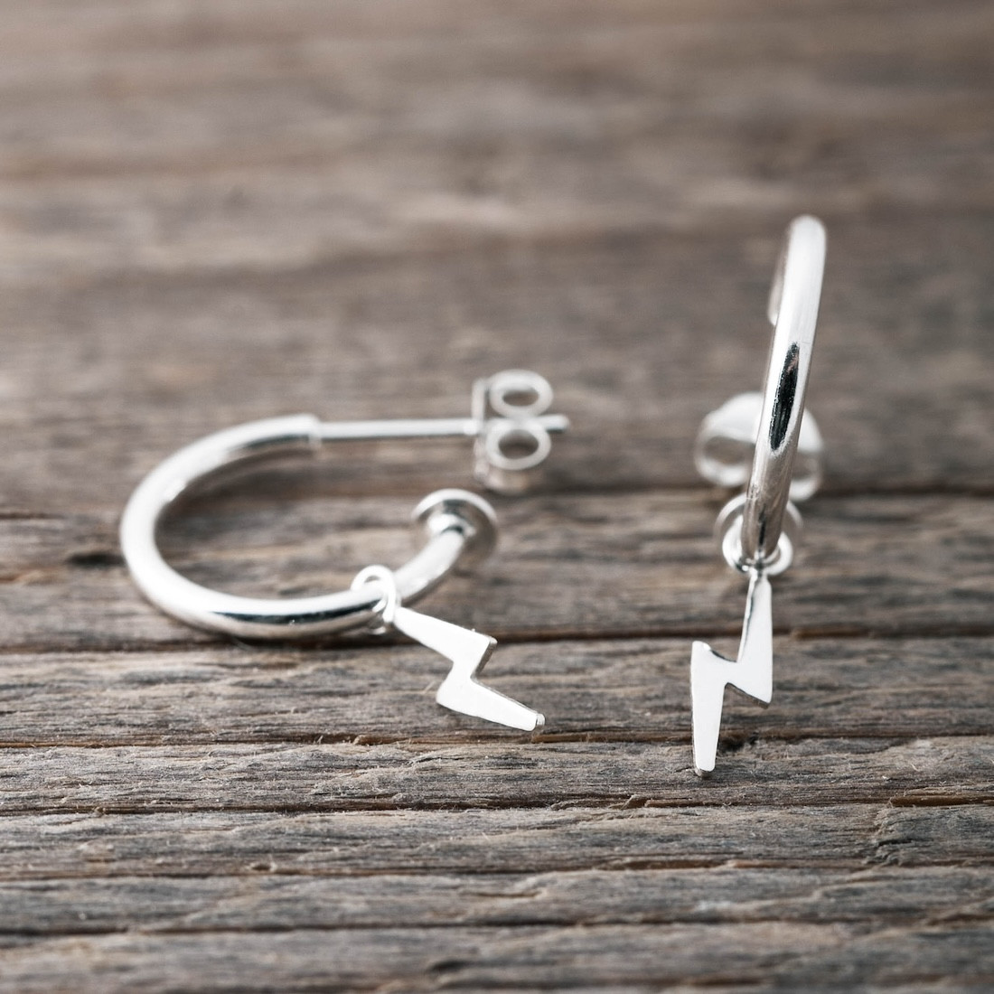 Silver earrings hoops with lightning bolt
