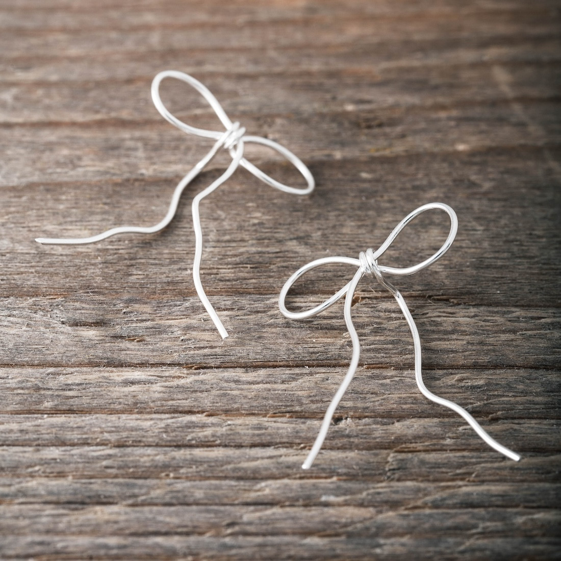 Silver earrings Stand Out Bow