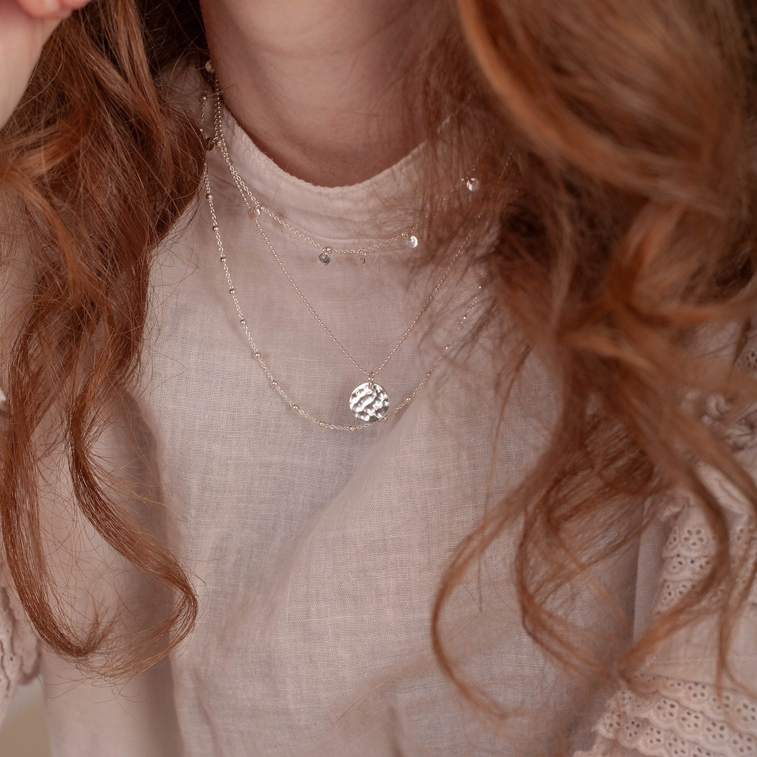 Silver necklace hammered disc