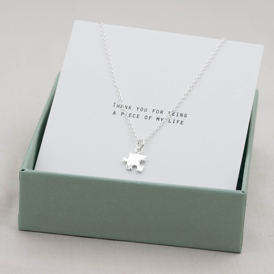 Silver necklace small puzzle