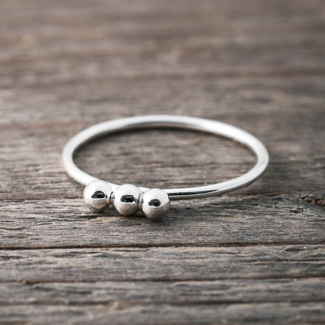 Silver ring thin with three balls