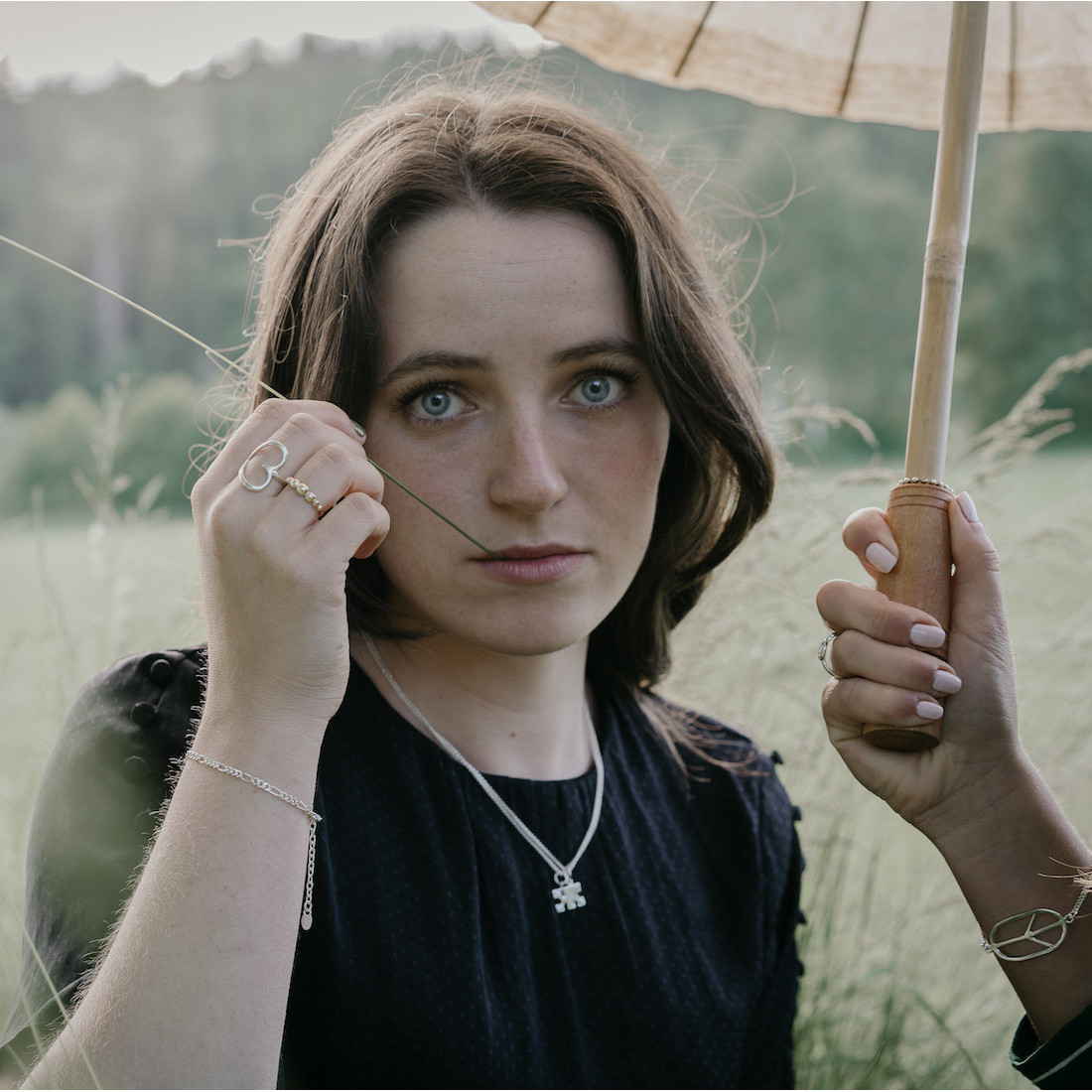 Silver pendent puzzle piece