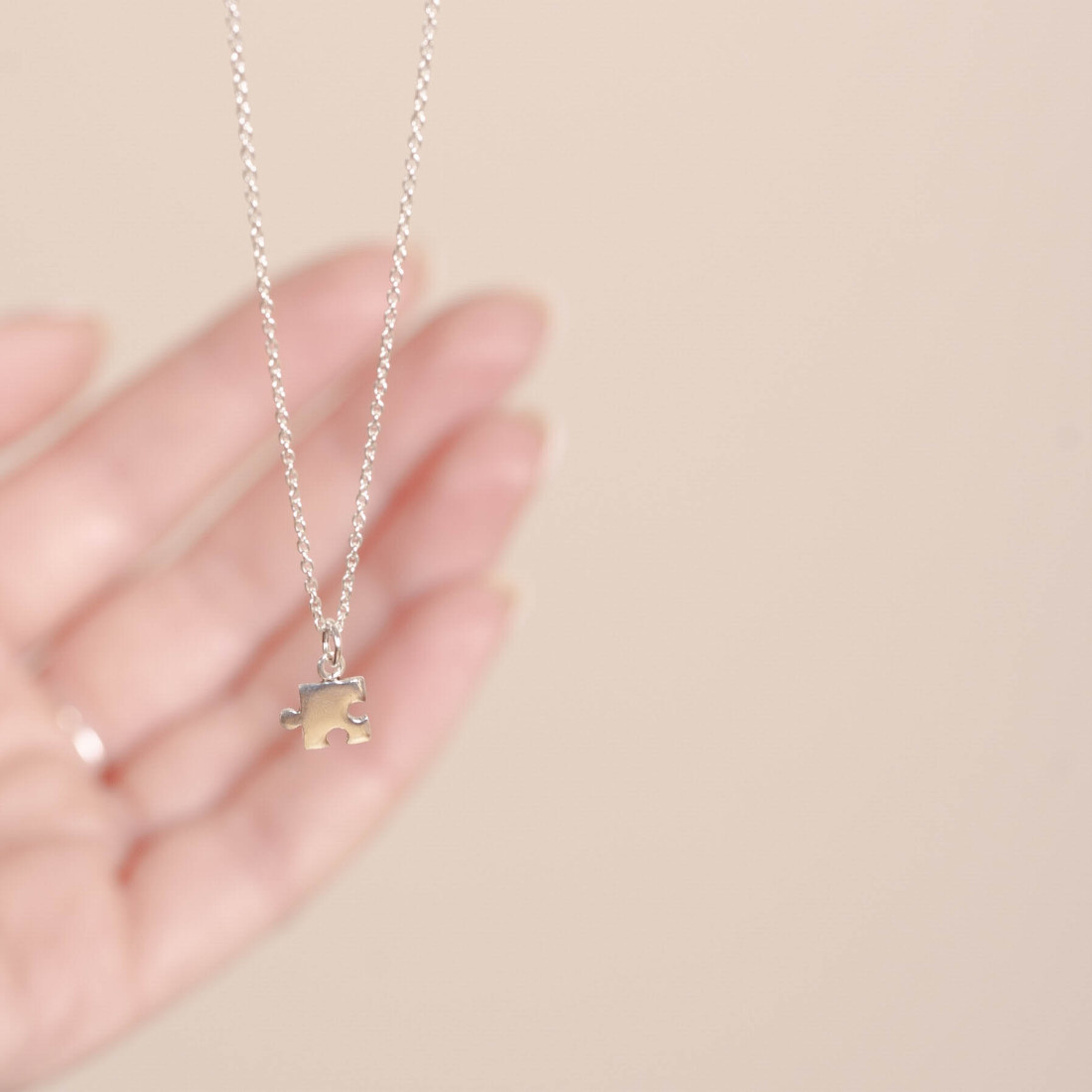 Silver necklace small puzzle