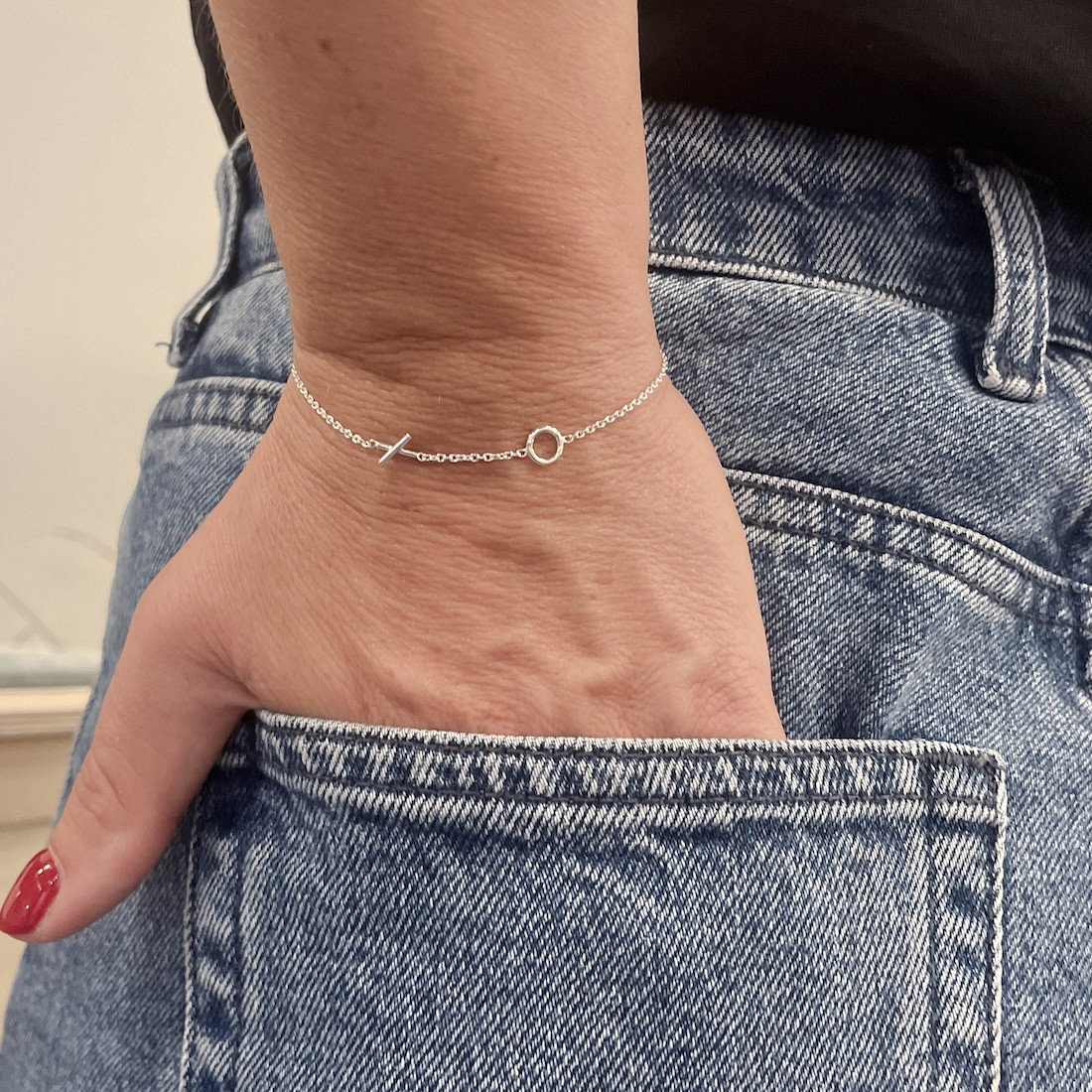 Silver bracelet X O