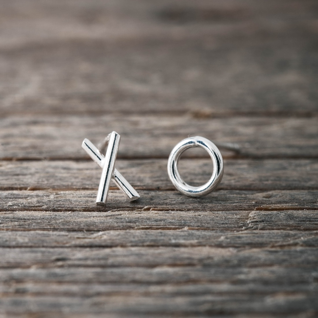 Silver ear studs X O