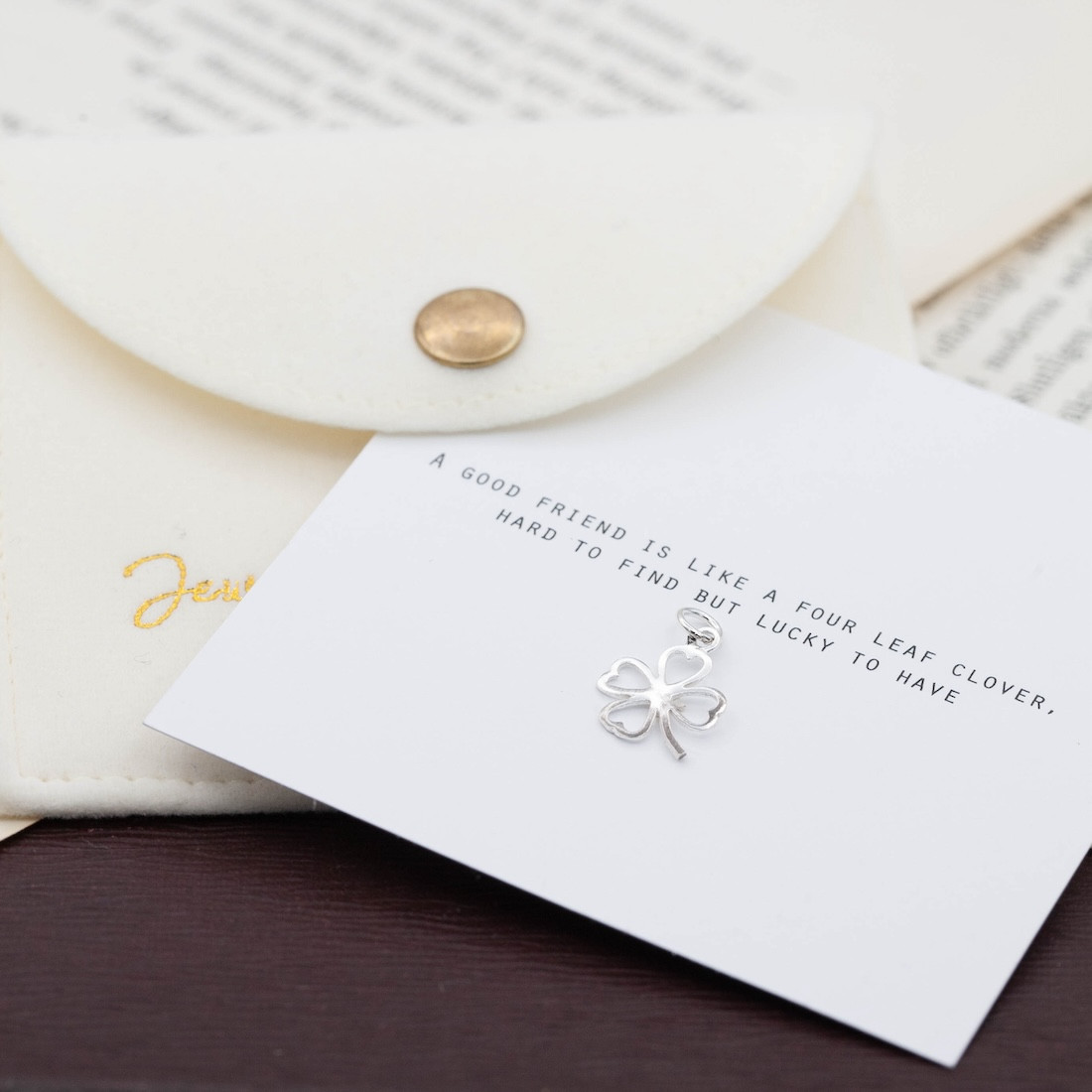 Silver charm four leaf clover