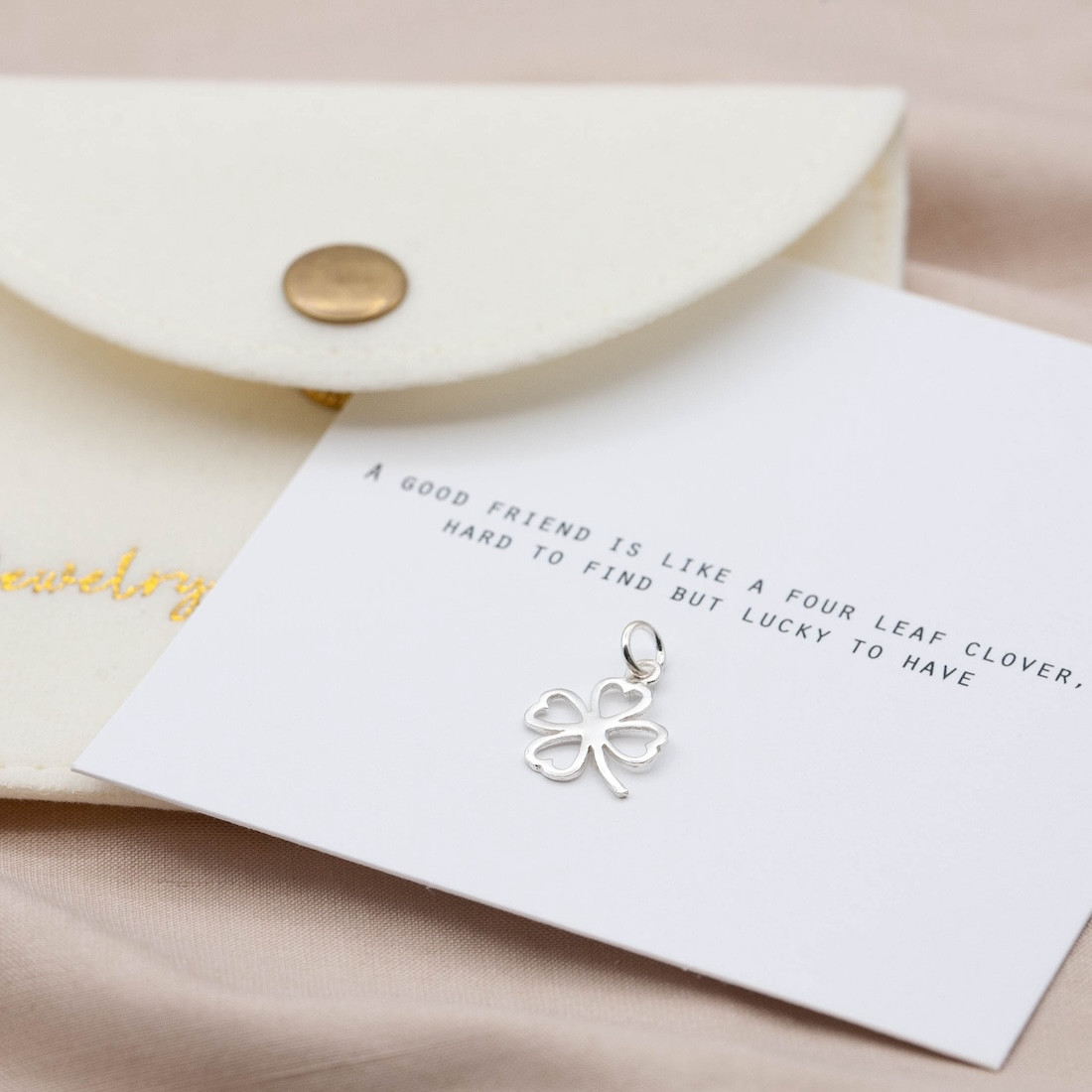 Silver charm four leaf clover