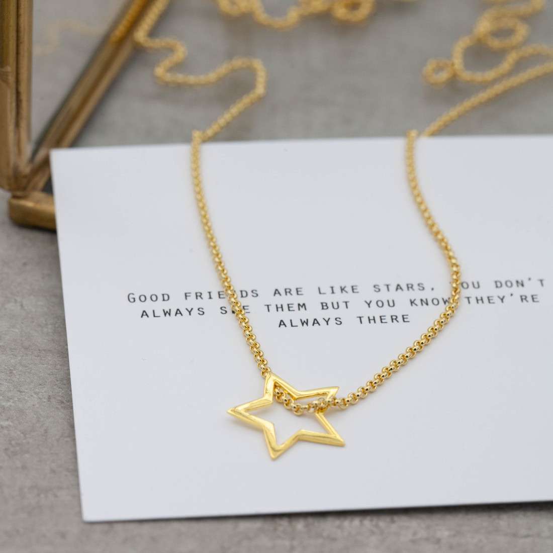 Silver chain with open star