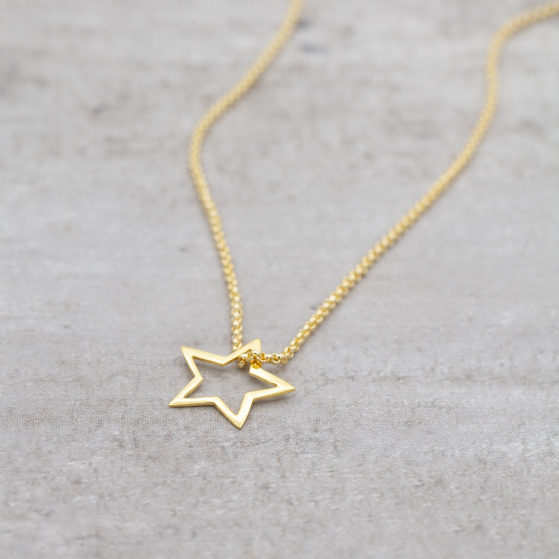 Silver chain with open star