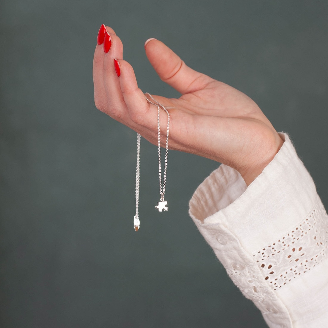 Silver necklace small puzzle