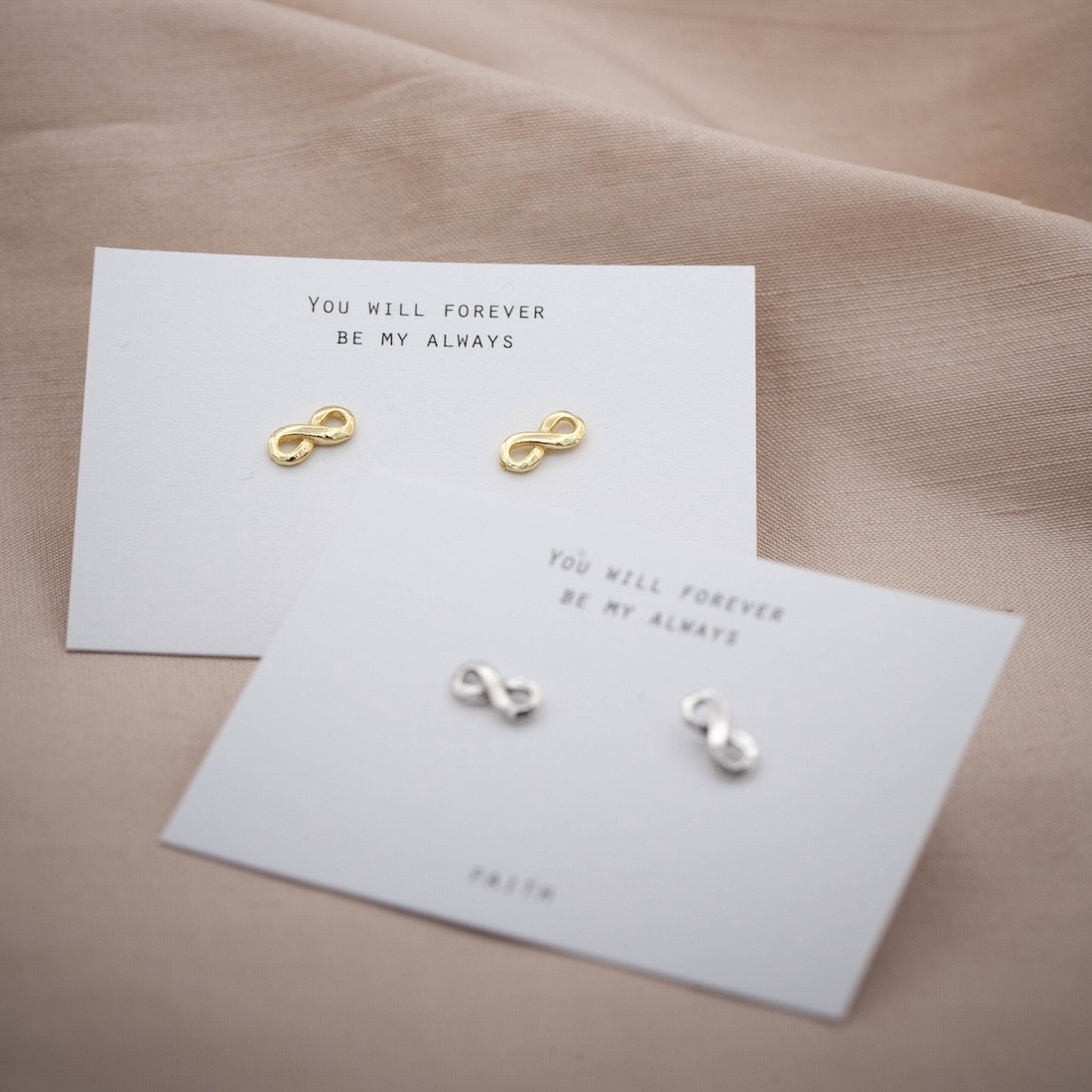 Gold earrings small infinity