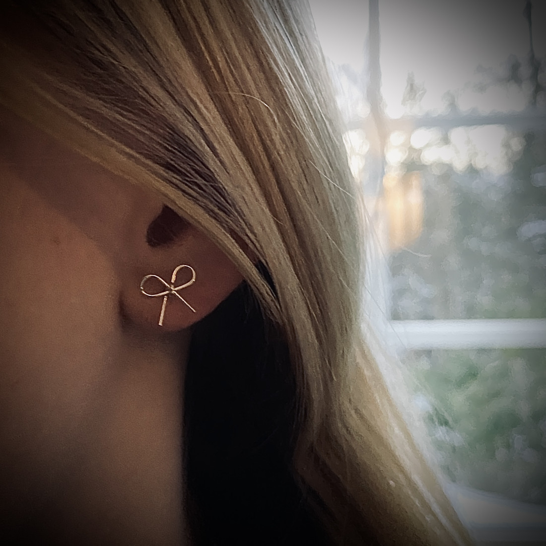 Silver earrings bow