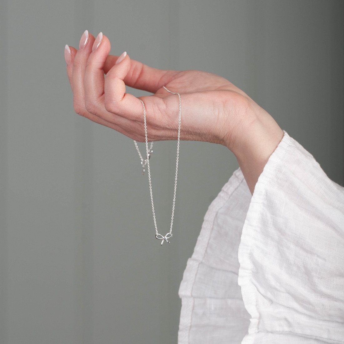 Silver necklace small bow