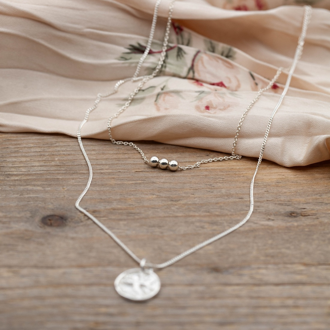 Silver necklace with silver 3  balls